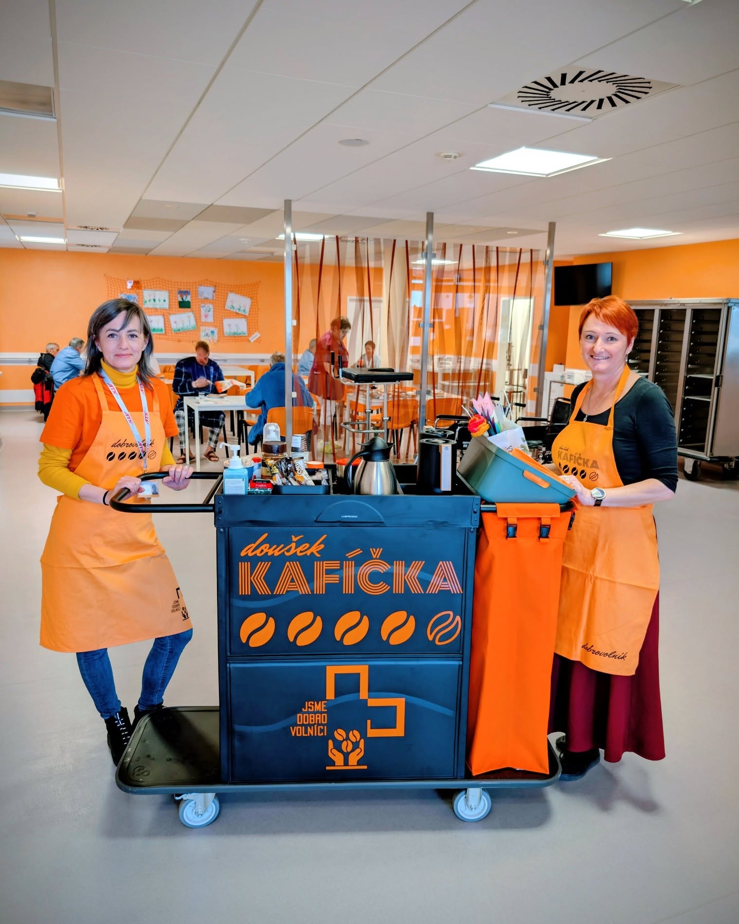 Volunteers serving coffee